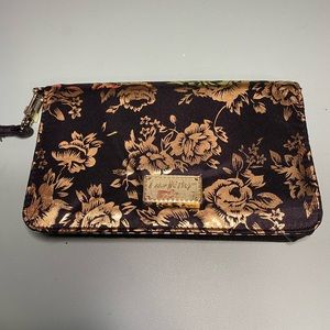 betsey Johnson black with gold flower wristlet